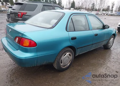 1999 Toyota Corolla Ce из США, поврежденный, VIN 1NXBR12E8XZ259296